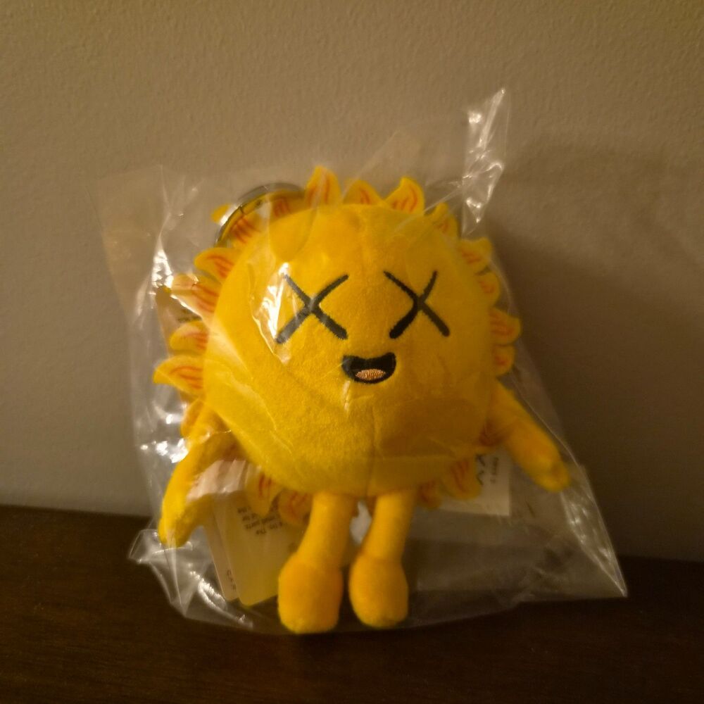 KAWS x Uniqlo Universe Charm Keychain Yellow Sun 2026 Brand New